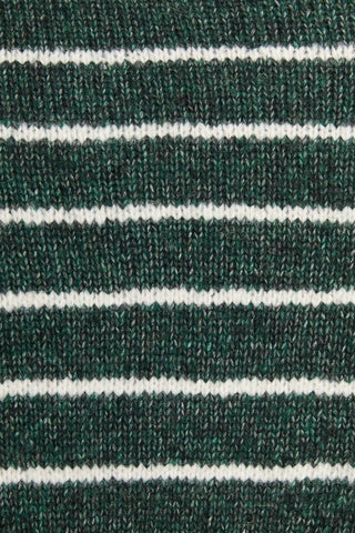 Close-up of green and white striped fabric texture