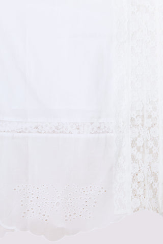 Close-up of a textured white surface with subtle patterns