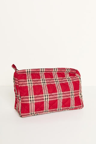Red plaid toiletry bag on a white background