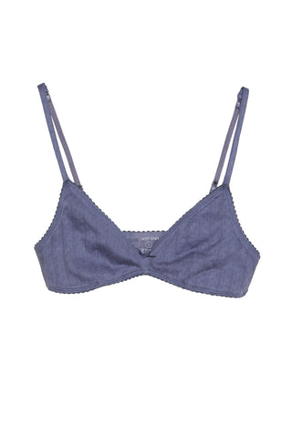 Blue bralette with thin straps on a white background